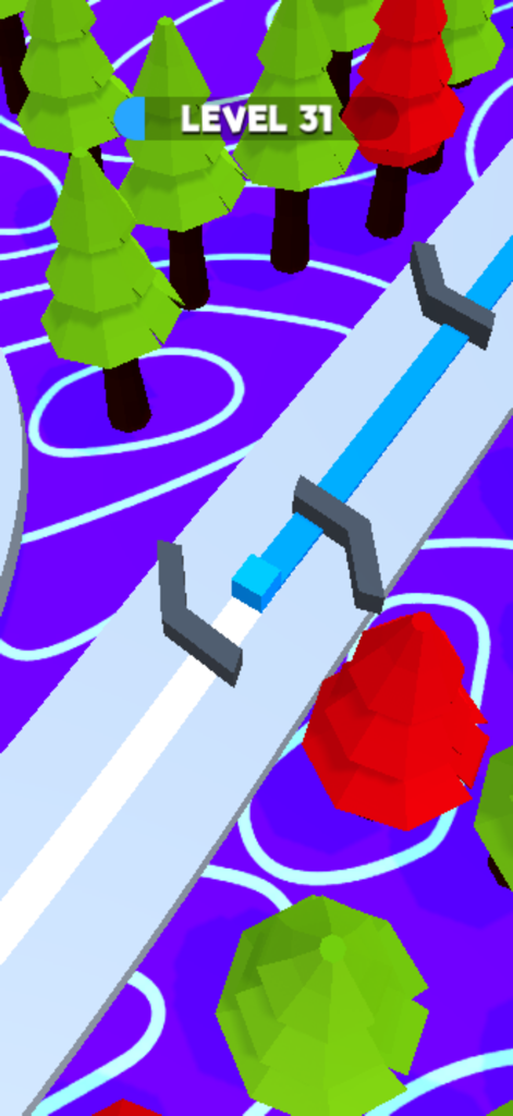 Cube Escape:Color Path - Un bloque azul moviéndose por un camino blanco entre árboles verdes y rojos de baja poligonización en el juego Cube Escape Color Path