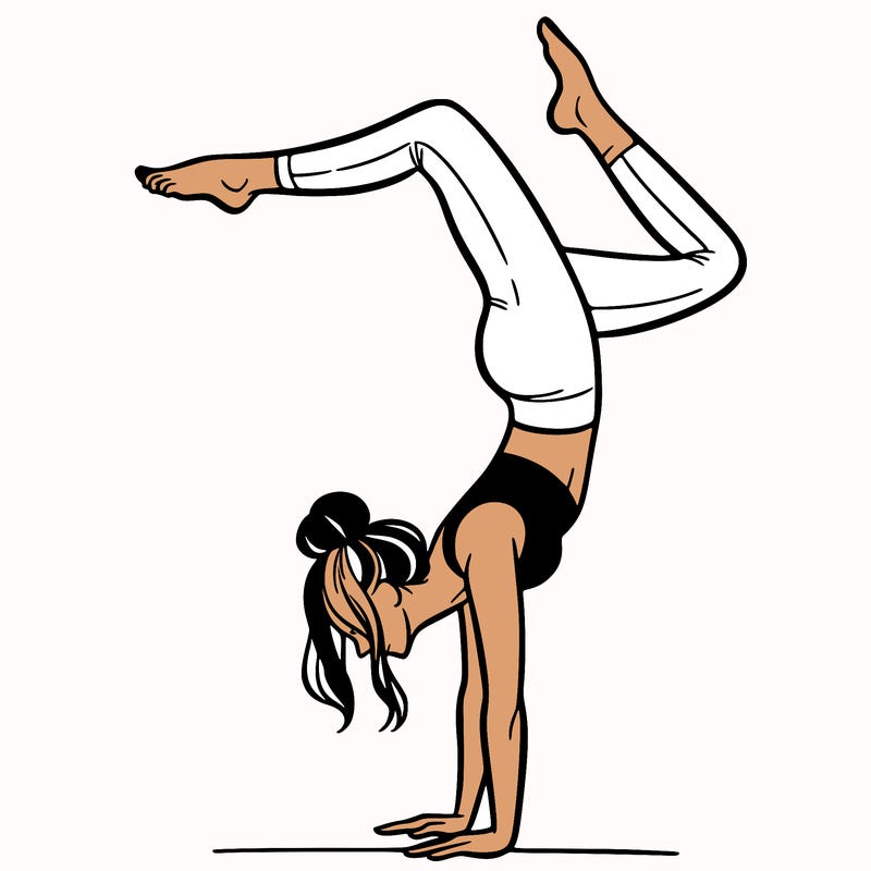 a woman doing a handstand
