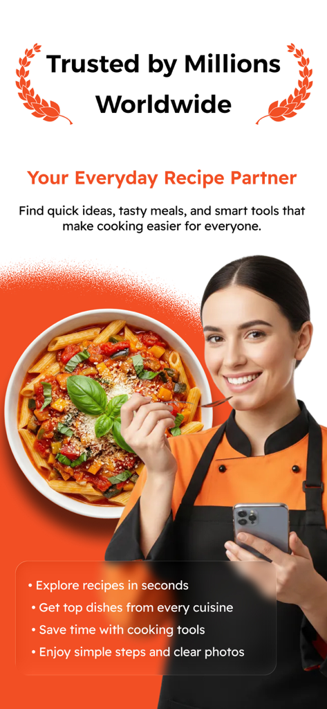 パスタのボウルの隣にあるallrecipesアプリを搭載したスマートフォンを持っているシェフ