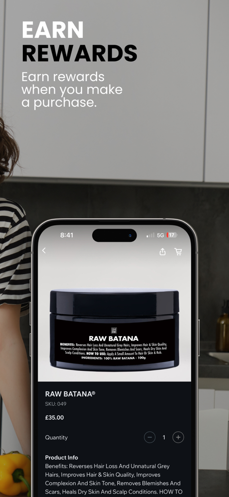 EAT TO LIVE NOT TO DIE - A mobile phone displaying the Raw Batana product page and a rewards announcement within the Eat To Live Not To Die app.
