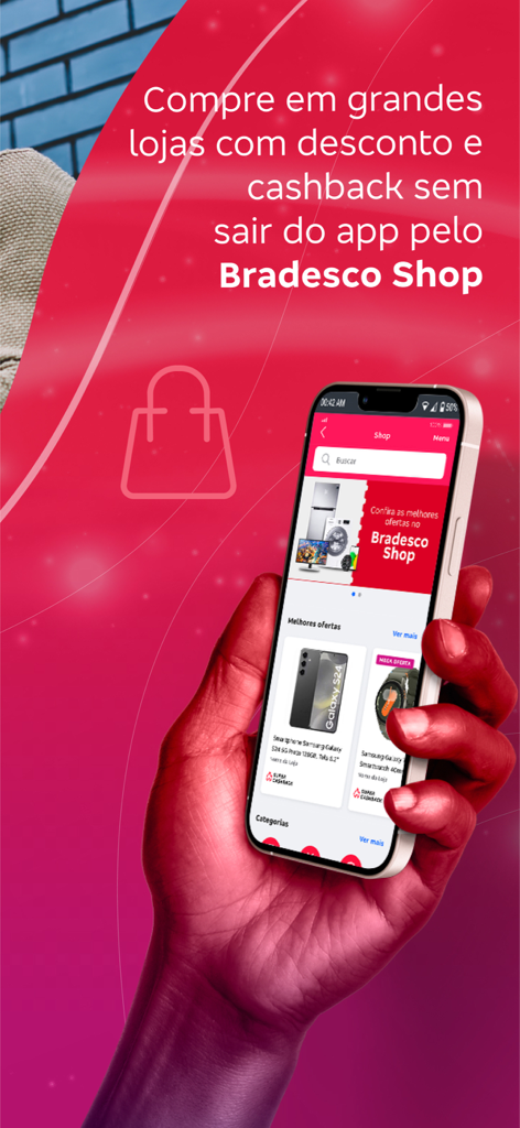 Uma mão segurando um smartphone exibindo a interface do Bradesco Shop com ofertas de desconto e cashback em eletrônicos.