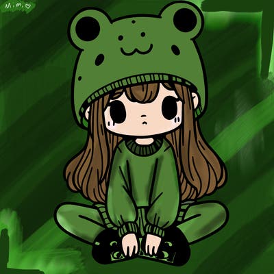 a girl wearing a frog hat and some frog socks