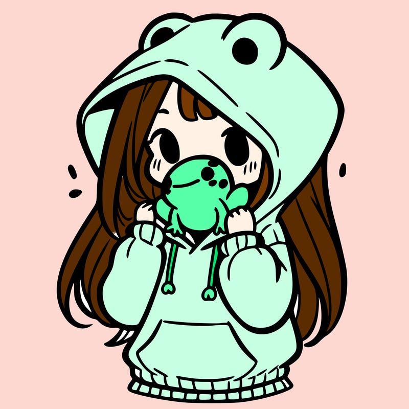 a girl holding a froggy hoodie