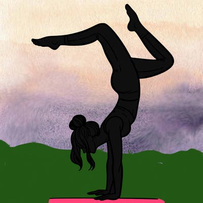 a woman doing a handstand