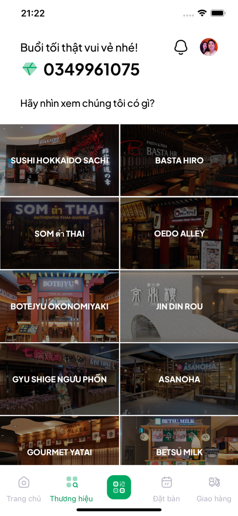 iGourmet app screen displaying a list of available Asian restaurant brands like Sushi Hokkaido Sachi and Som Tum Thai