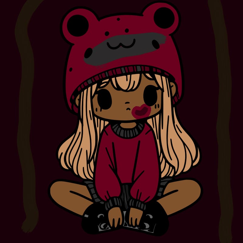 a girl wearing a frog hat and some frog socks