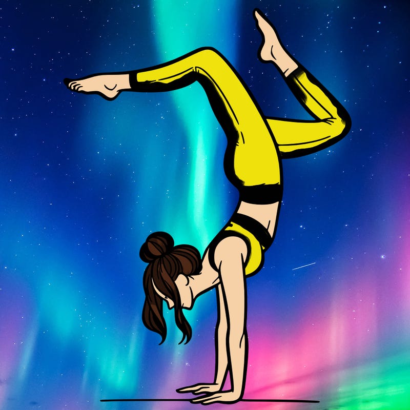 a woman doing a handstand