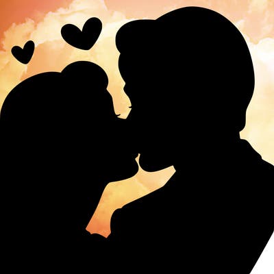 woman and man kissing