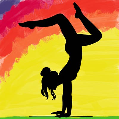 a woman doing a handstand