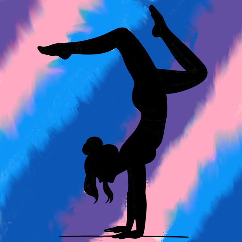 a woman doing a handstand