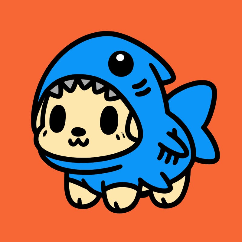 cute dog wearing a shark costume