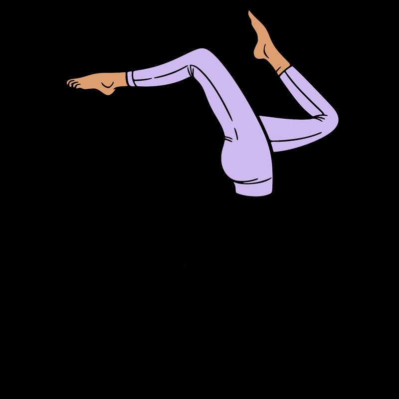 a woman doing a handstand