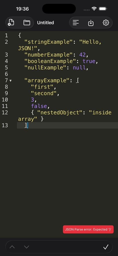 JSONCraft mobile editor interface displaying syntax highlighting and a real-time parse error message