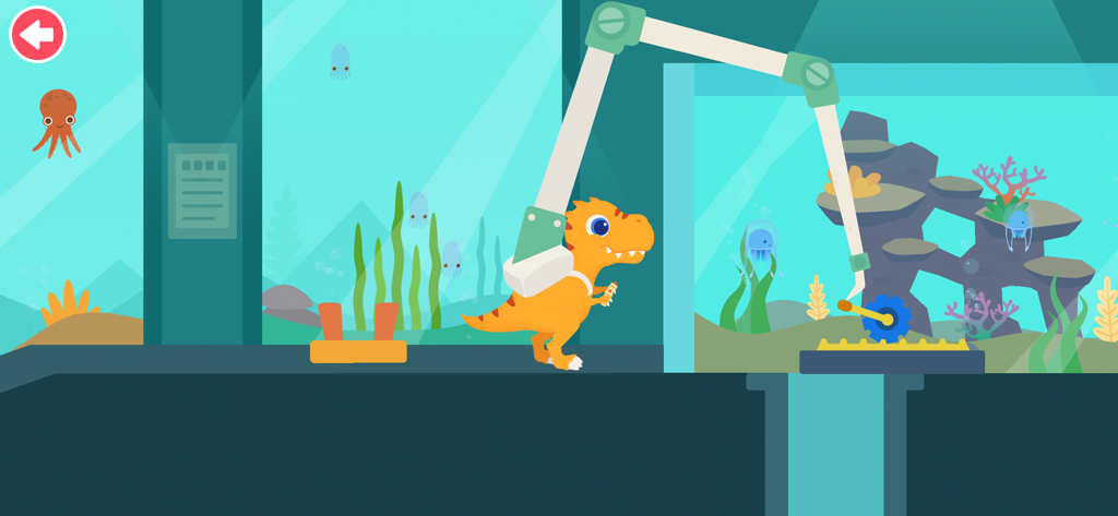 Orange dinosaur character using a robotic arm inside an aquarium facility