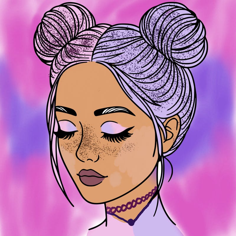 woman with hair buns