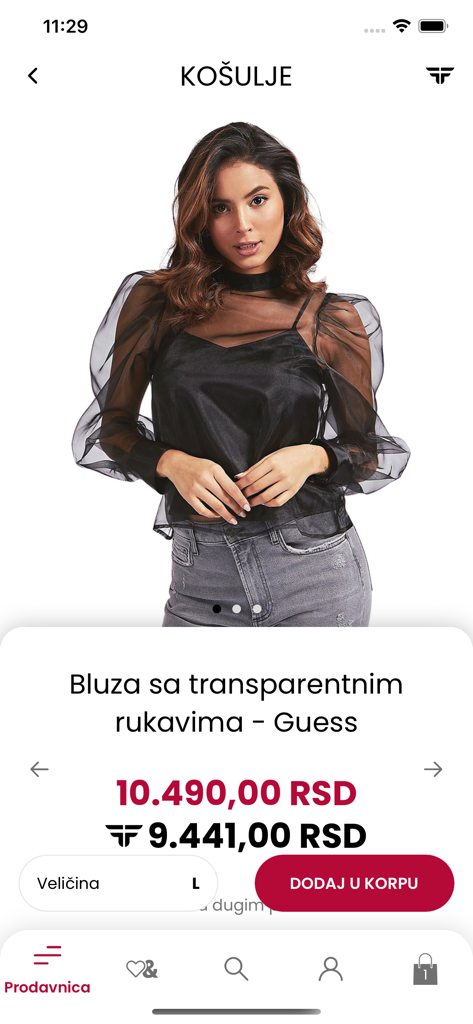 Fashion&Friends - Pantalla de producto de la app móvil mostrando una blusa negra Guess con mangas transparentes y precios