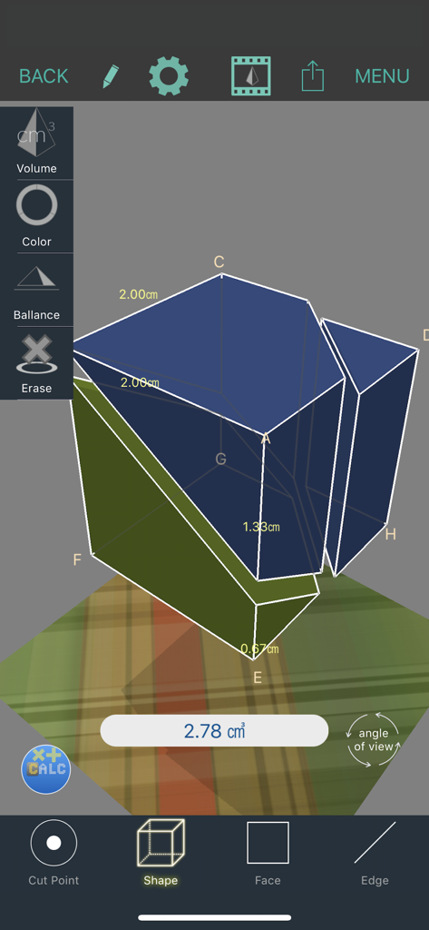 A screenshot of the Mathematical Playground app showing a 3D geometric shape with volume calculation and edge measurements.