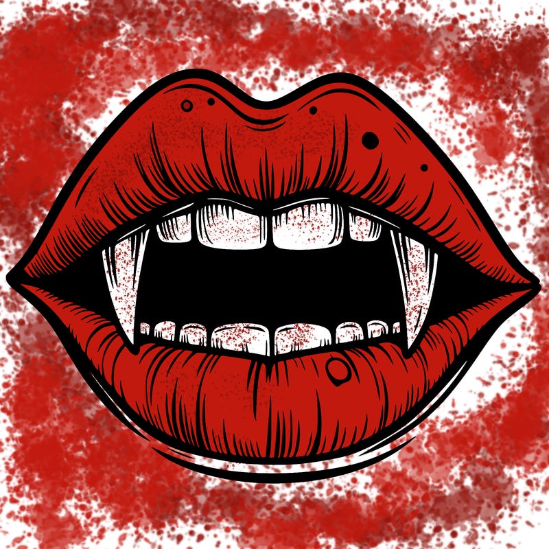 lips with vampire teeth