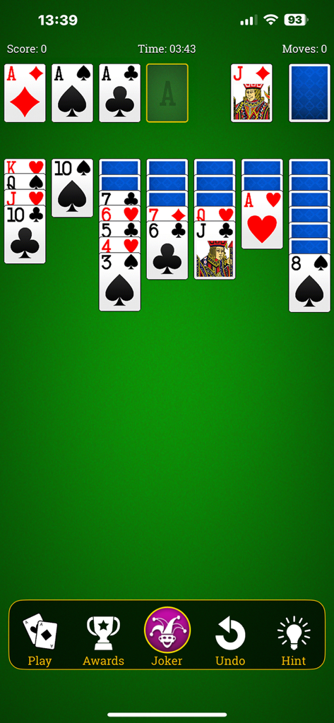 Classic solitaire game interface showing cards on a green background.