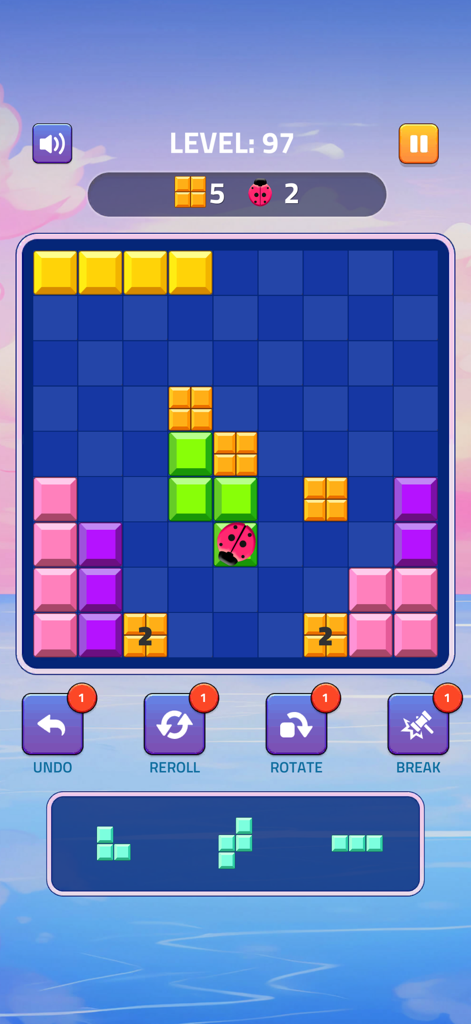 Block Puzzle - Gems Adventure - Juego de Block Puzzle Gems Adventure mostrando una colorida cuadrícula de bloques con un ícono de mariquita y botones de potenciadores del juego