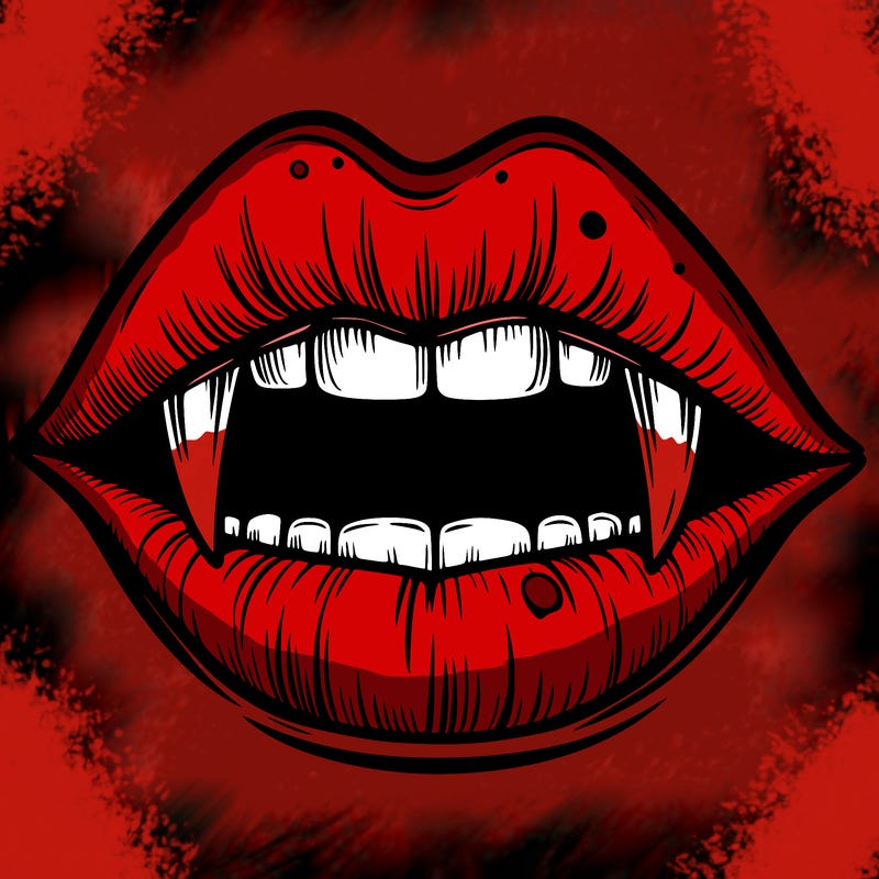 lips with vampire teeth