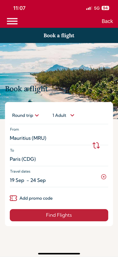 Air Mauritius app flight booking screen showing options for a round trip from Mauritius to Paris.