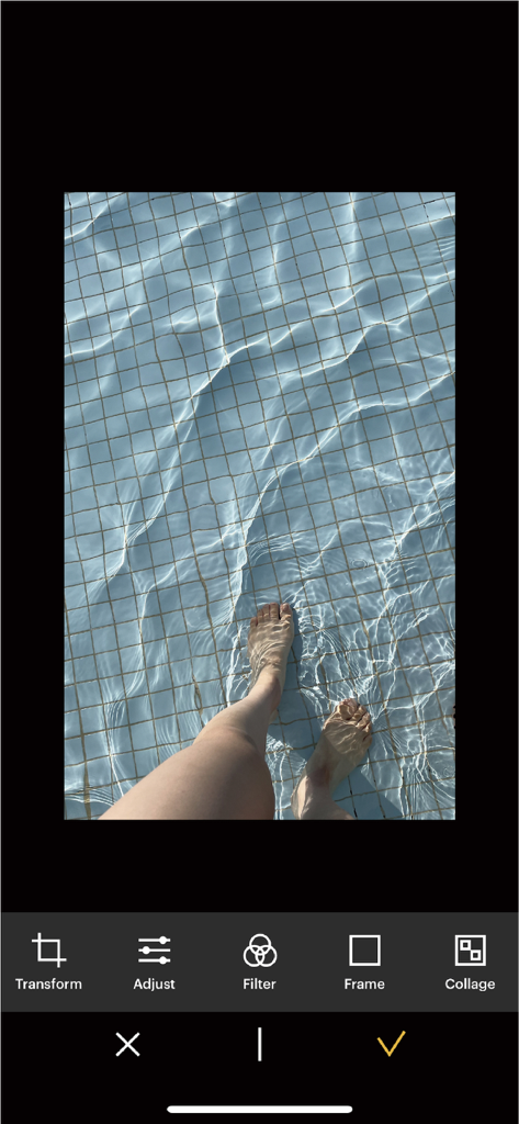 KODAK Photo Printer app editing interface showing photo adjustment tools and a pool photo
