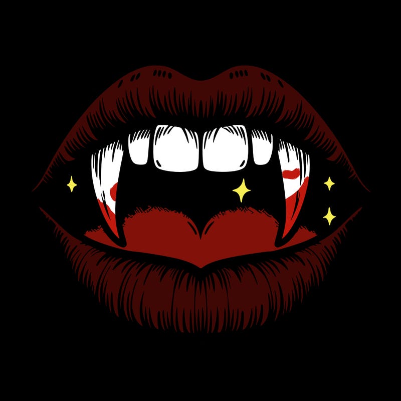 lips with vampire teeth
