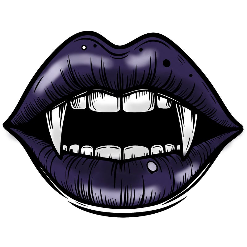 lips with vampire teeth