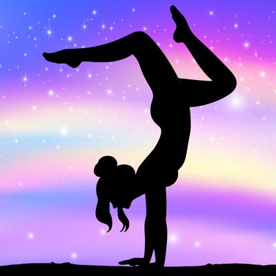 a woman doing a handstand