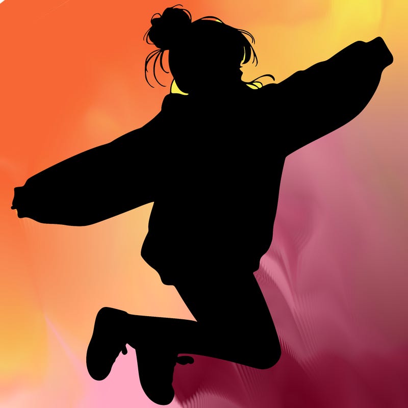 realistic girl jumping with a bun and oversized sweatshirt