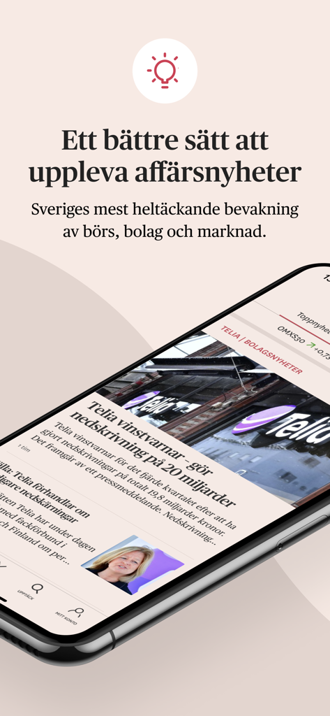 Omni Ekonomiの金融ニュースアプリがビジネスの見出しを表示しているスマートフォン。