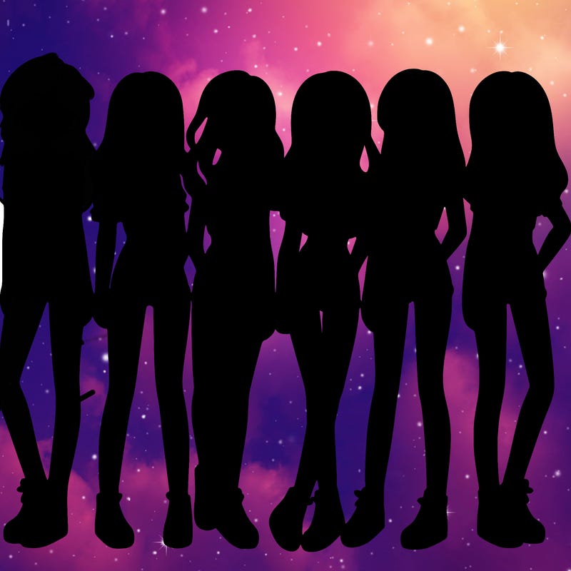 a group of girls wearing crop tops and shorts