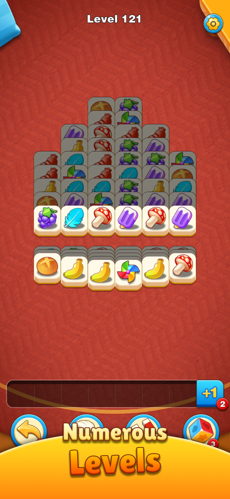 Tile Story - Match Life Puzzle - Bildschirm mit Kachel-Abgleich-Rätselspiel, der verschiedene bunte Symbole und den Spielfortschritt zeigt