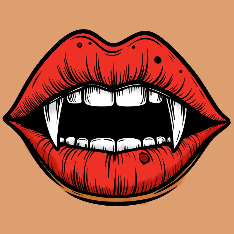 lips with vampire teeth