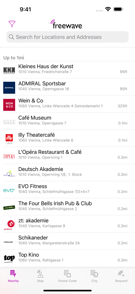 Freewaveアプリのインターフェース内に、距離と住所が表示されたオーストリア、ウィーンの無料Wi-Fiホットスポットのリスト。
