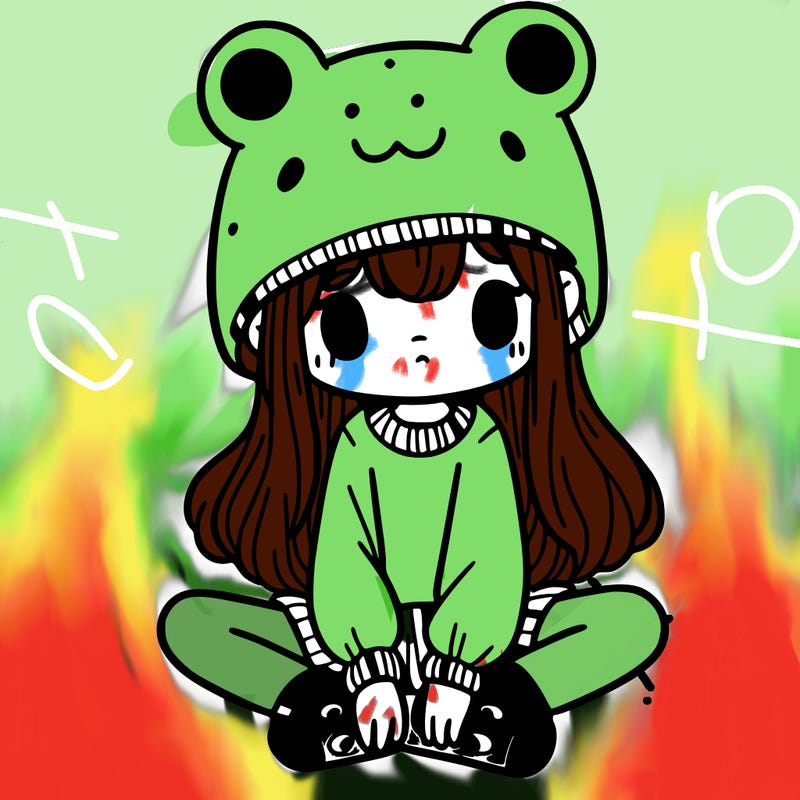 a girl wearing a frog hat and some frog socks