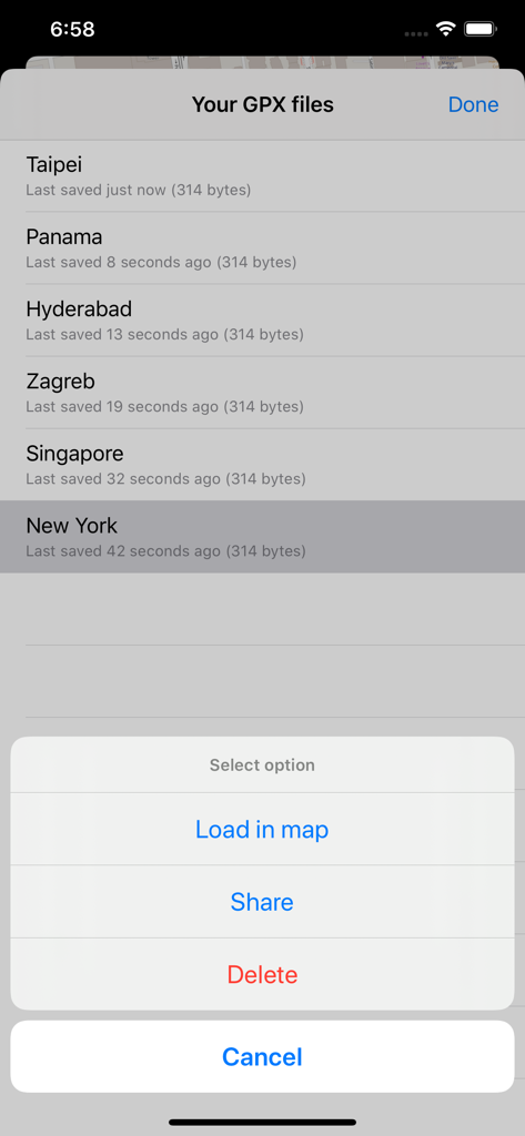 Lista de rastros GPX guardados con opciones para cargar, compartir o eliminar.