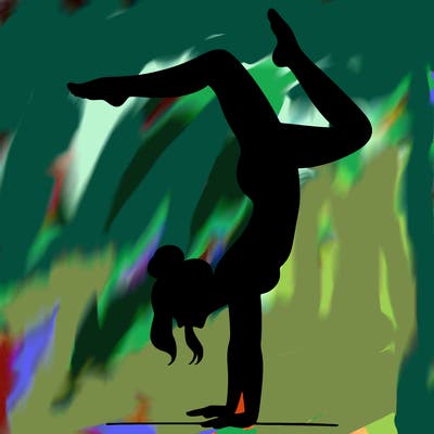 a woman doing a handstand