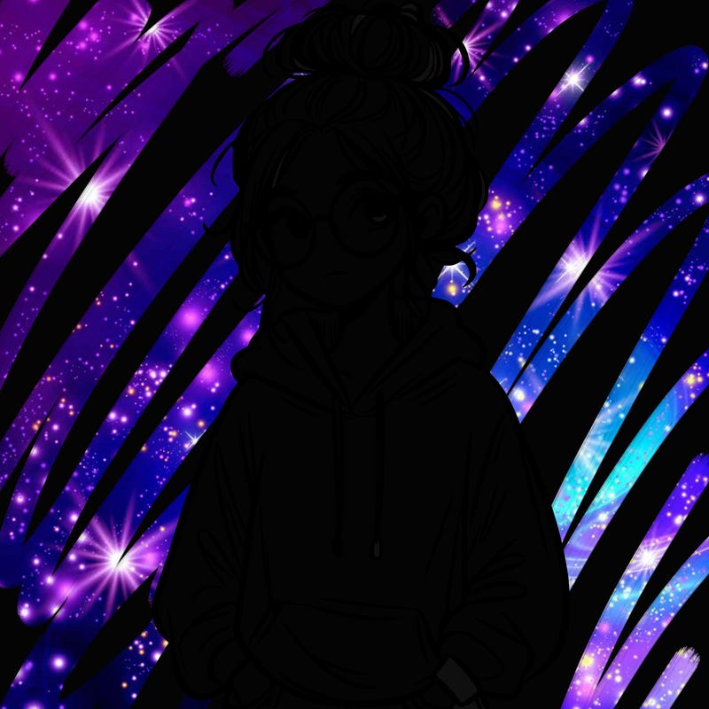 teen girl with a messy bun and glasses wearing a loose hoodie and jeans