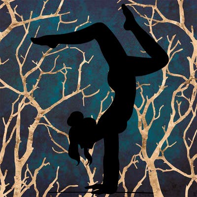 a woman doing a handstand