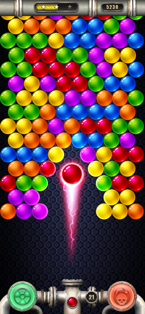 Gameplay of Bubbles Empire Champions showing a red bubble shot towards colorful spheres with power ups