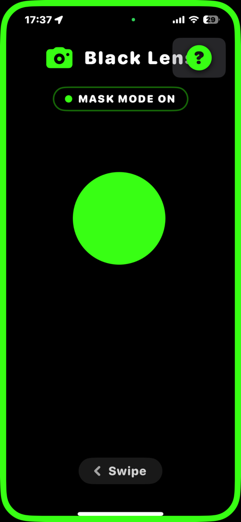 Black Lens - Screenshot of the Black Lens app in Mask Mode featuring a high-contrast interface with a large green circle indicating face detection on a black background