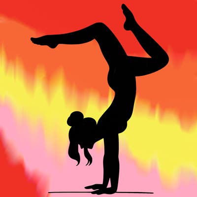 a woman doing a handstand