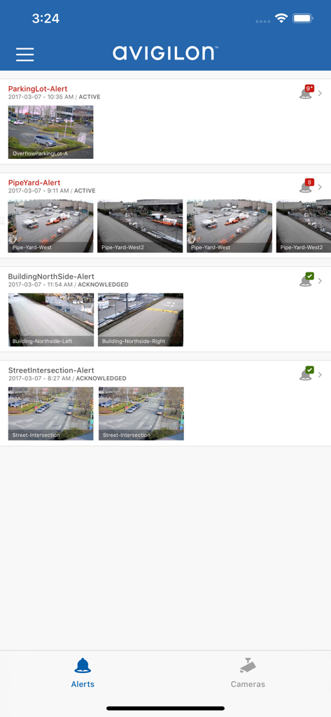 ACC Mobile 3 - Avigilon ACC Mobile 3 security alert dashboard with real time camera thumbnails of a parking lot and building.
