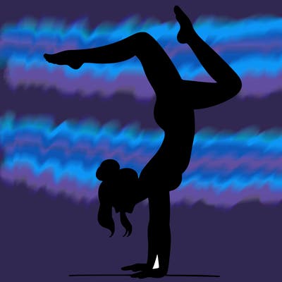a woman doing a handstand