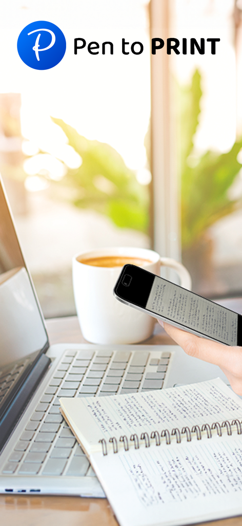PenToPrint Handwriting to PDF - 机の上のノートの上の手書きノートをスキャンするためにスマートフォンを使用している人、ラップトップとコーヒーの隣