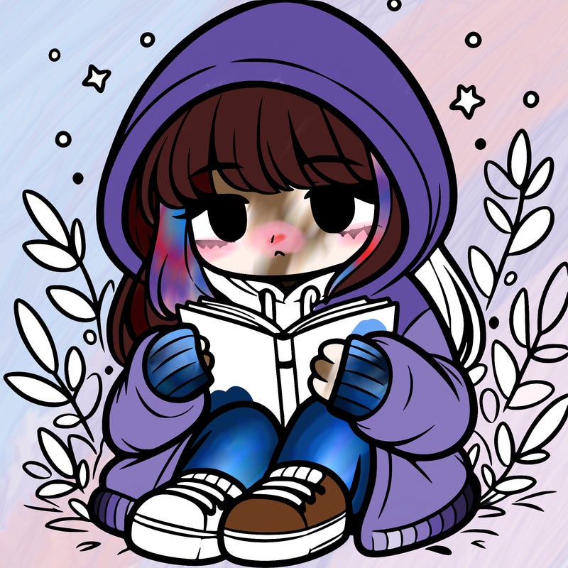 girl in oversized hoodie reading a book