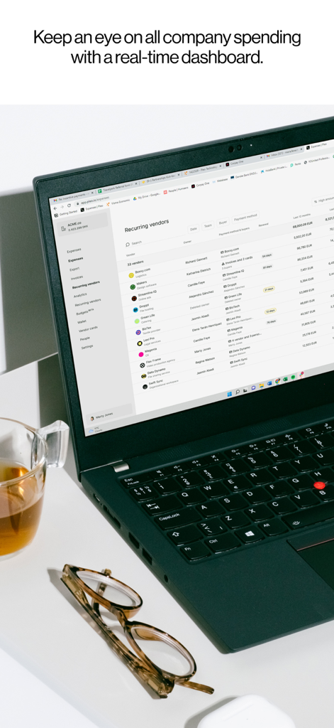 Pleo - A laptop screen displaying the Pleo real-time spending dashboard and recurring vendors list.