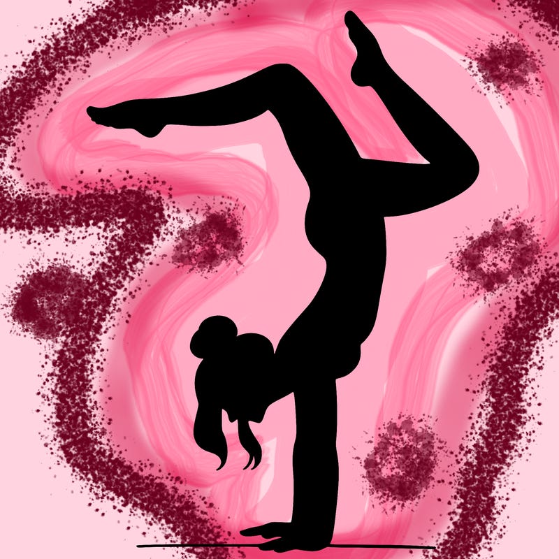 a woman doing a handstand